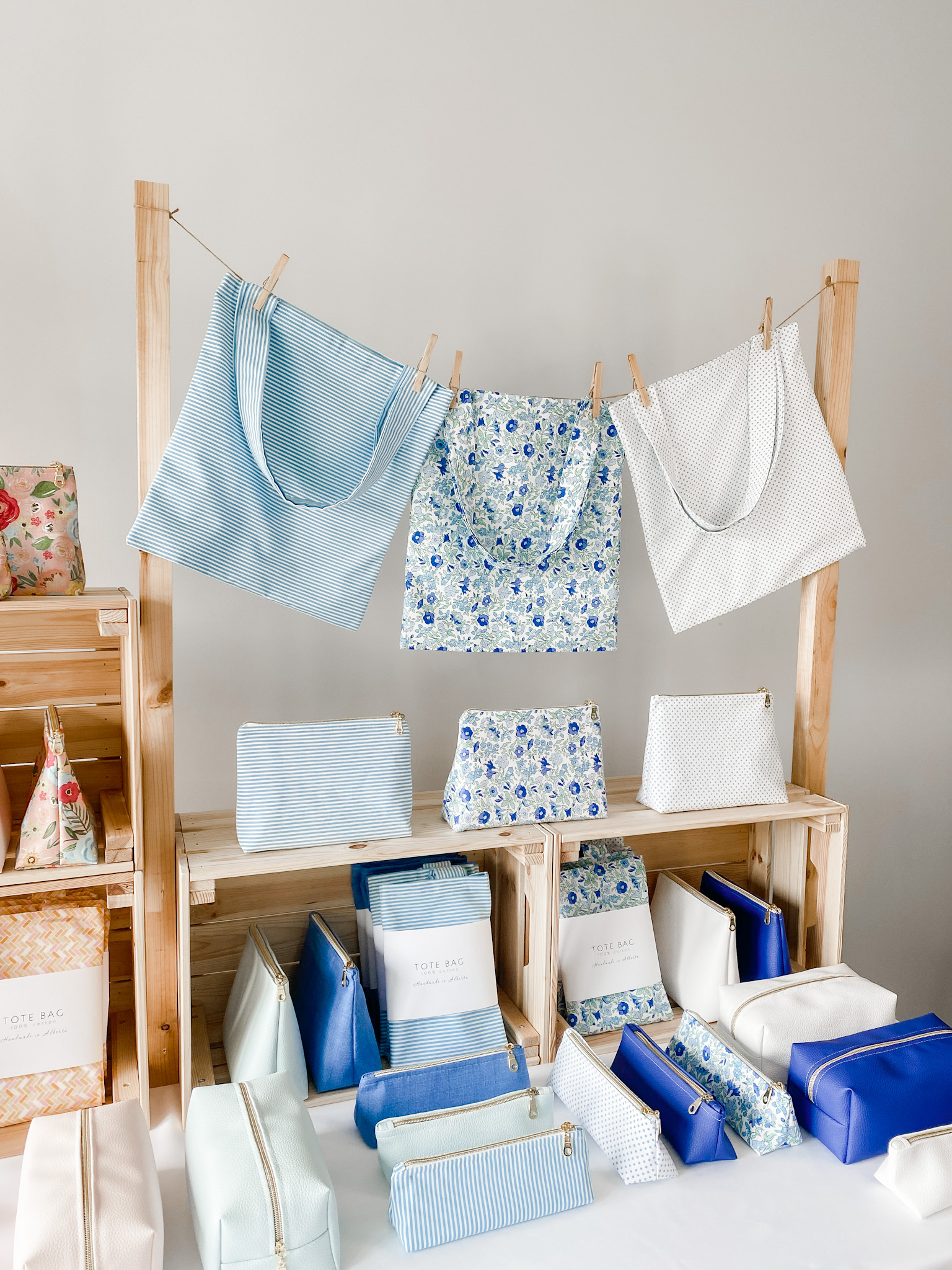 Clothesline to display totes at a craft show