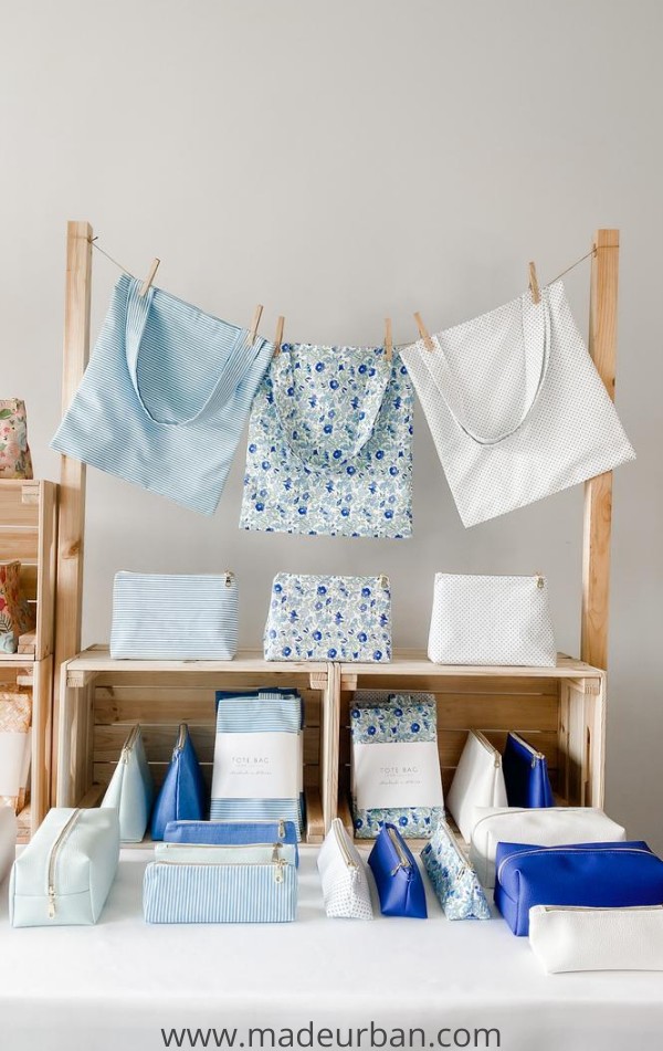 crates used to create a clothesline in a craft show display