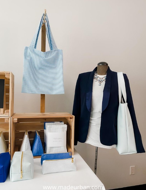 Bag shown on a bustform at a craft show